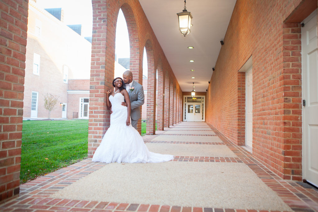 outdoor-wedding-bride-groom-lights-brick-kendra-dee-photography